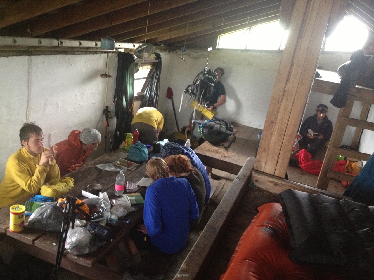 Hikers hiding from the rain